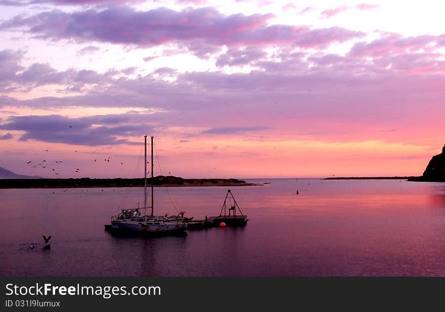 Anchored Sail Boats during sunset