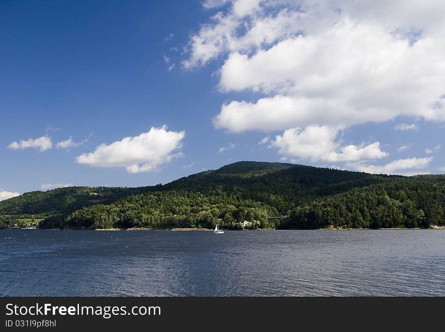 Beautiful lake located between the mountains on which you can sail.