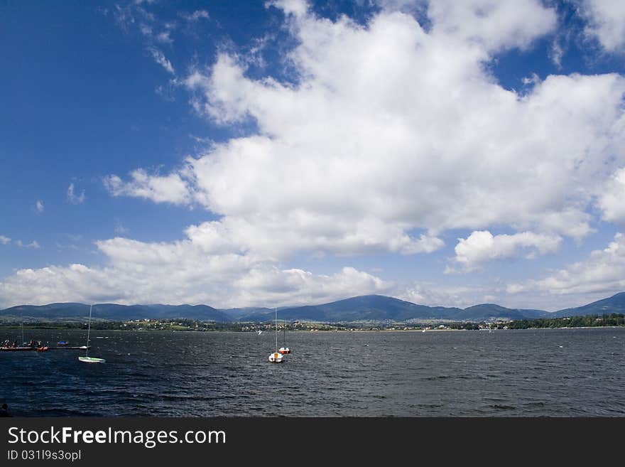 Beautiful lake located between the mountains on which you can sail.