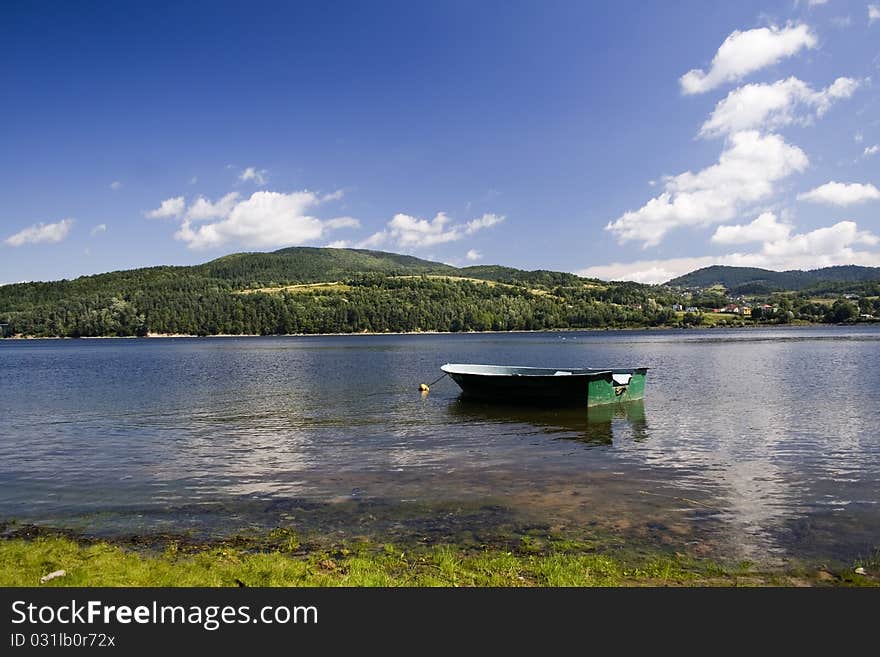 Beautiful lake located between the mountains on which you can sail.