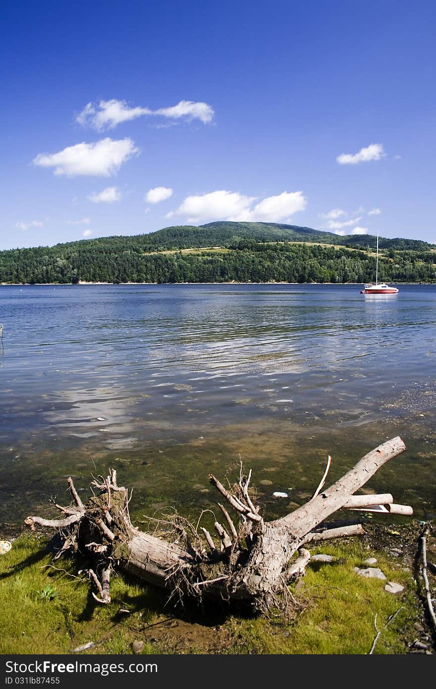 Beautiful lake located between the mountains on which you can sail.