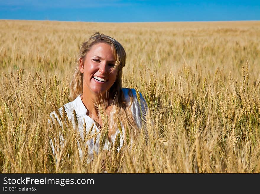 Woman in wheat field