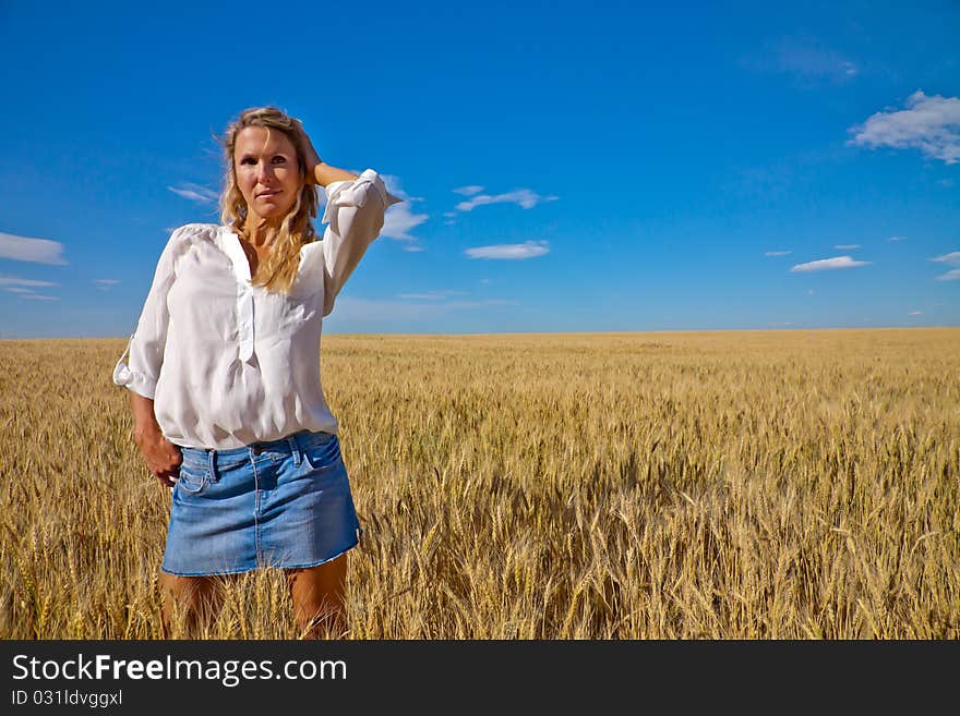 Woman in wheat field