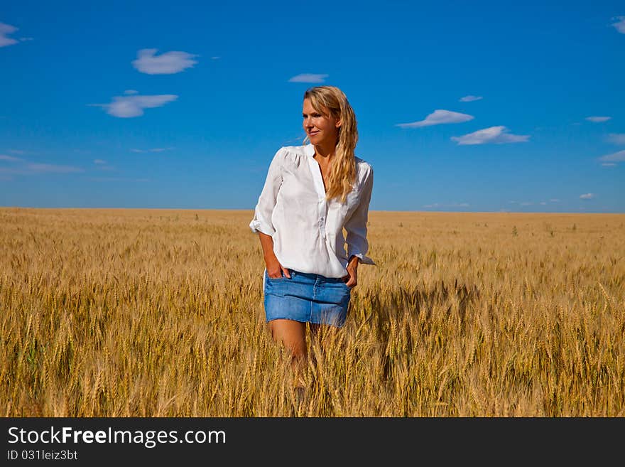 Woman In Wheat Field