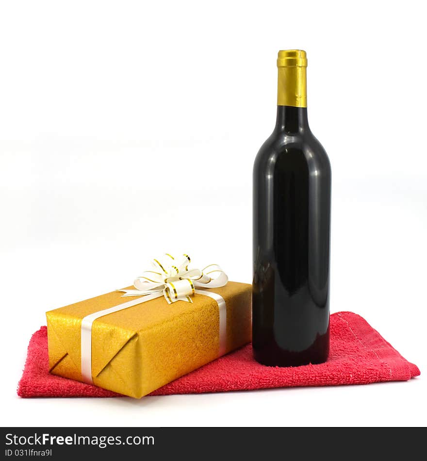 Wine bottle and gift isolated on white background