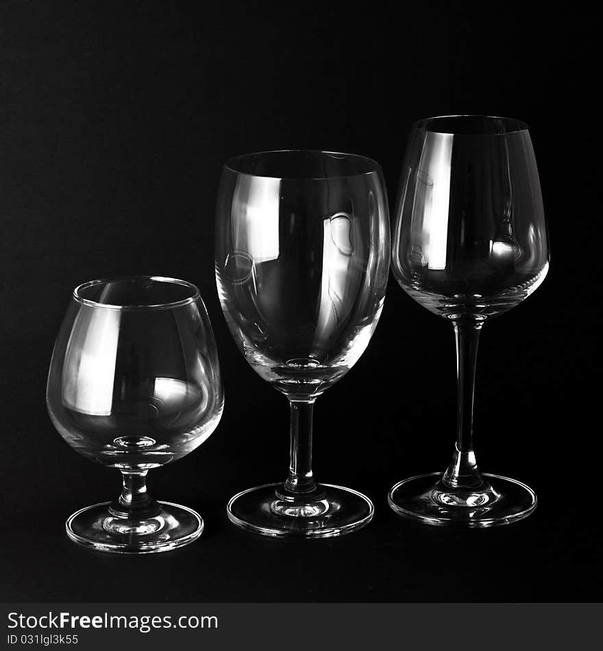 Three glass isolated on a black background