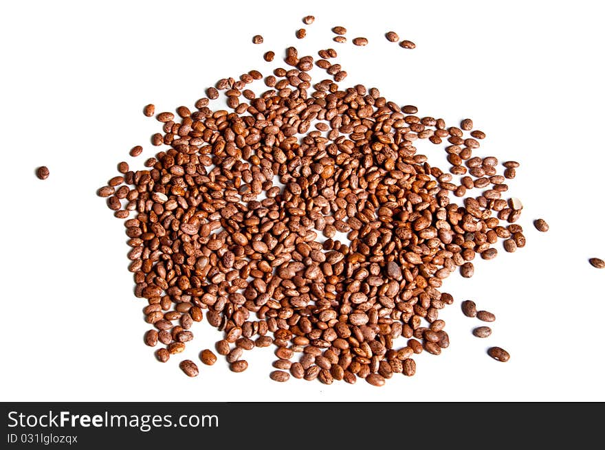 Pile of dried pinto beans, isolated