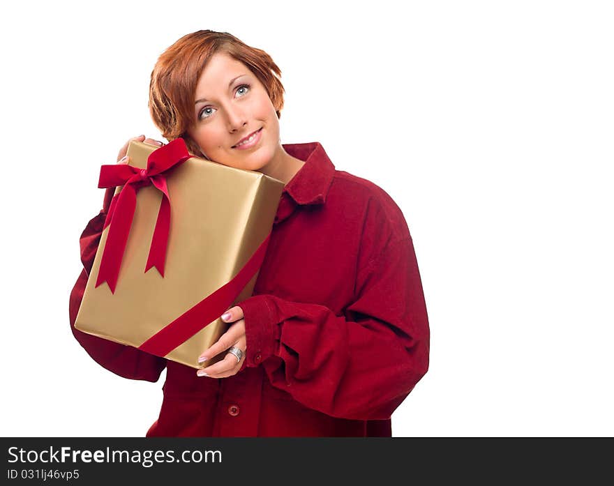 Pretty Red Haired Girl with Wrapped Gift Isolated on a White Background.