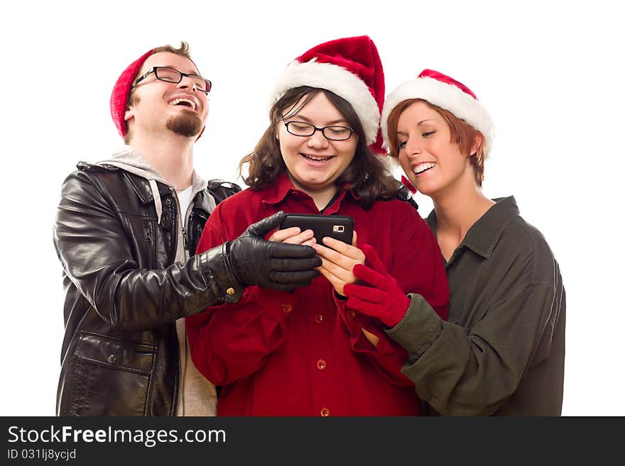 Three Friends Enjoying A Cell Phone Together Isolated on a White Background.