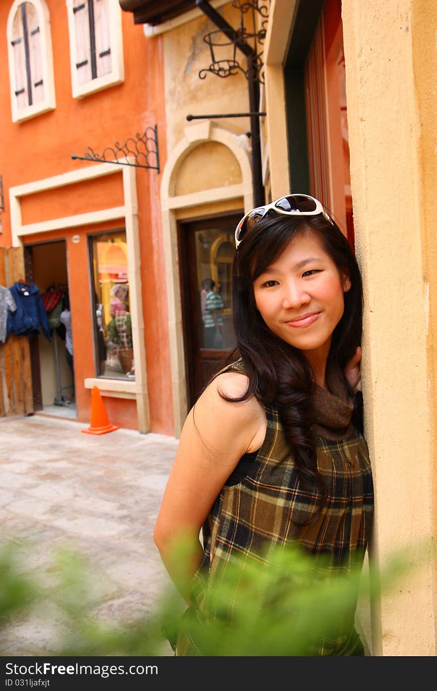 Smiling girl in the shopping mall.