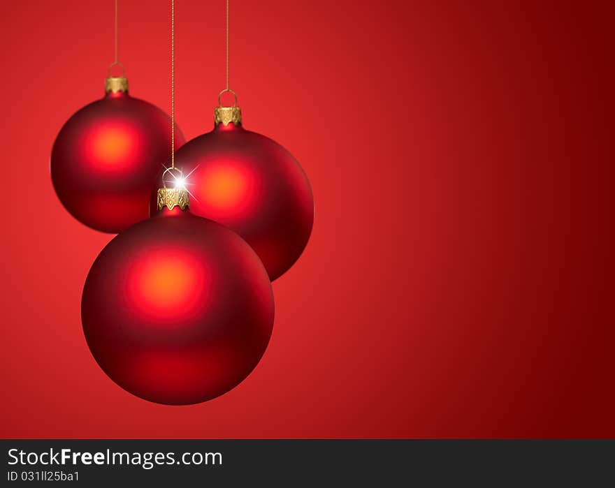Christmas balls on red backgroung