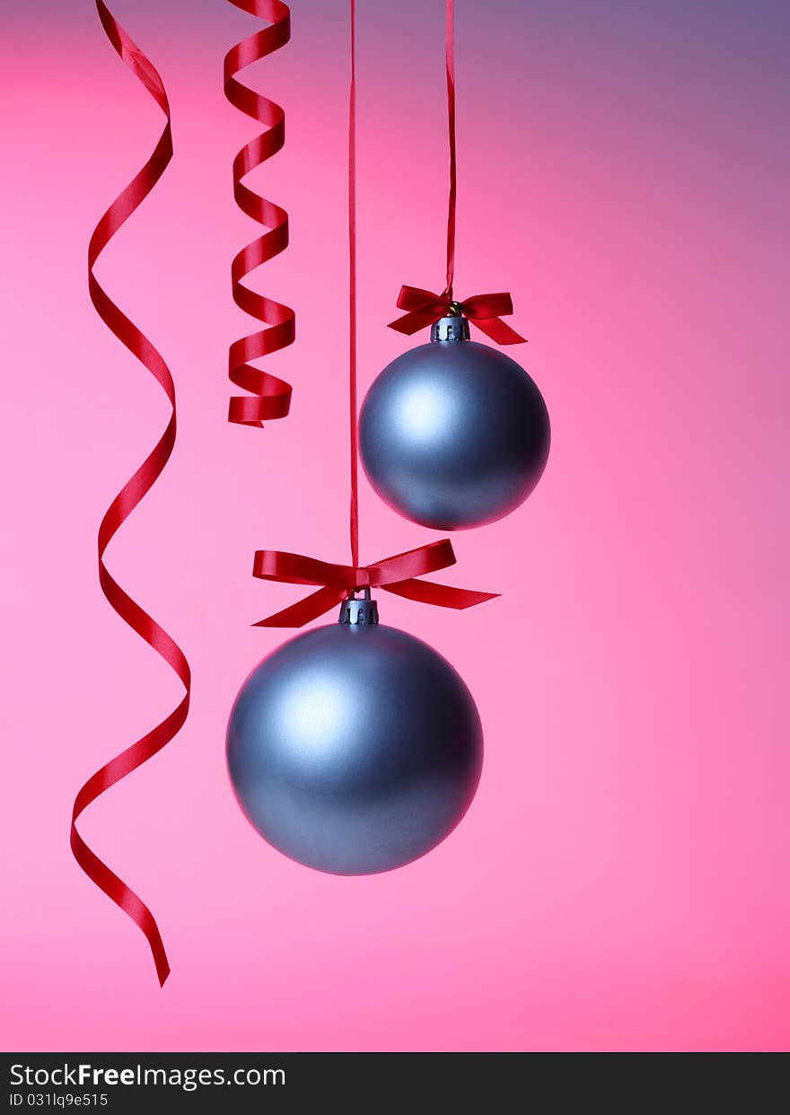 Christmas balls hanging with ribbons