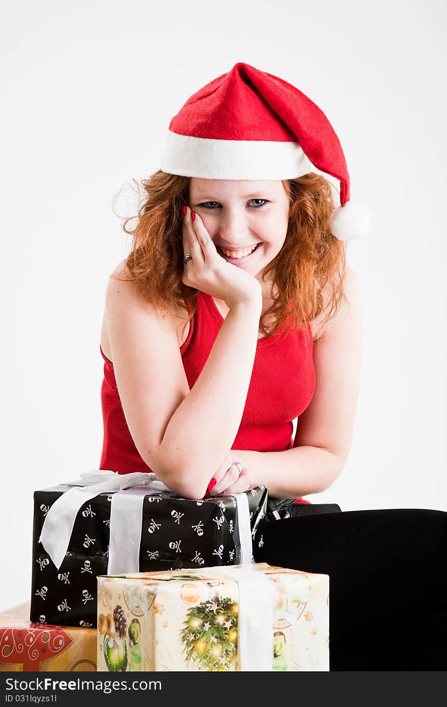 Beautiful red hair teen girl in santa costume. Beautiful red hair teen girl in santa costume