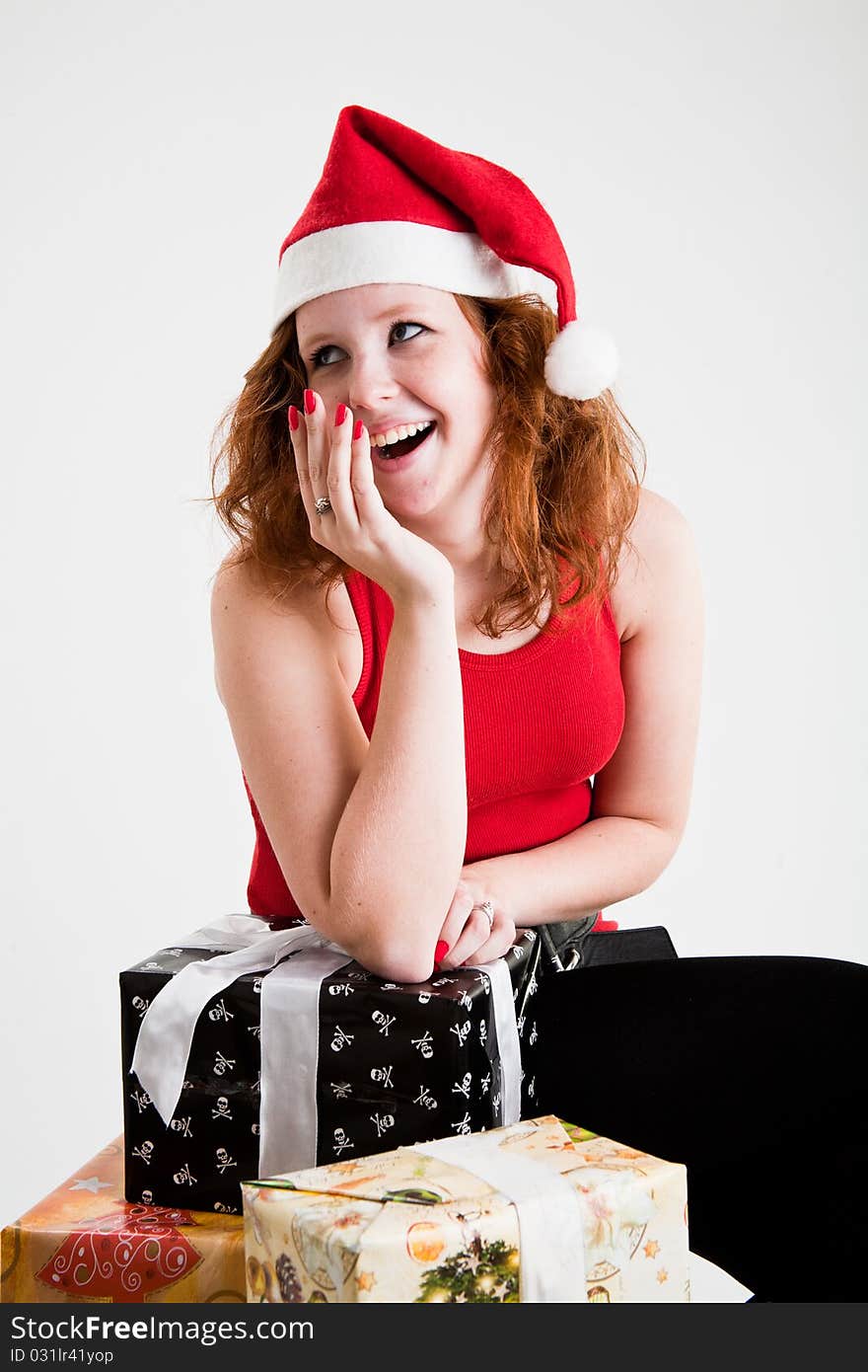 Beautiful red hair teen girl in santa costume. Beautiful red hair teen girl in santa costume