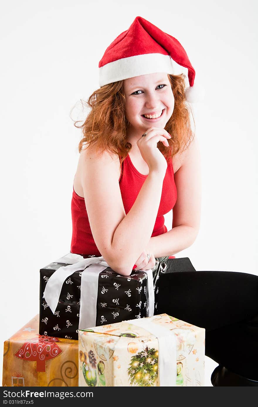 Beautiful red hair teen girl in santa costume. Beautiful red hair teen girl in santa costume