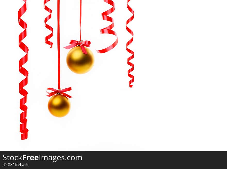 Christmas balls hanging with ribbons on white background