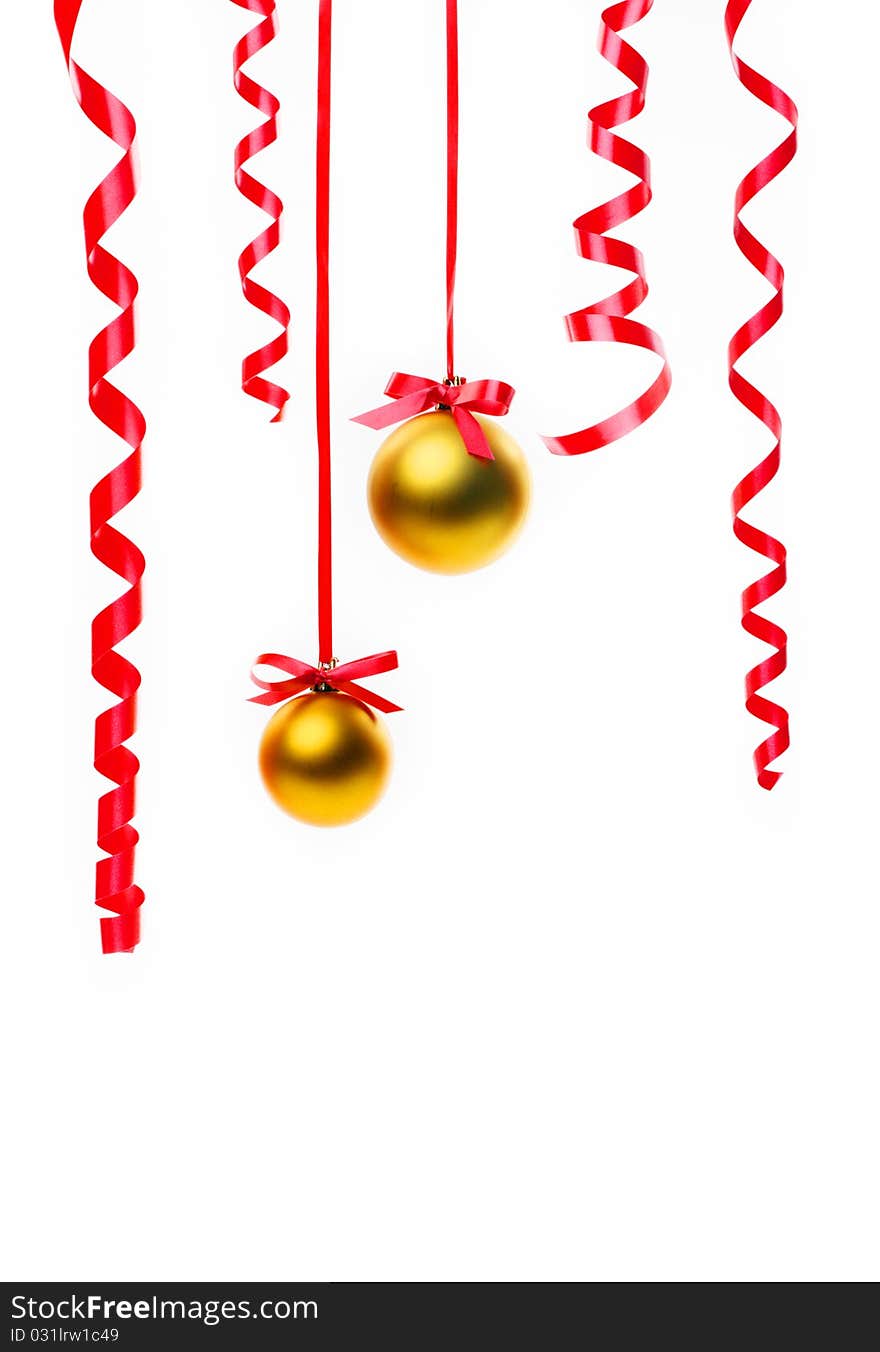 Christmas balls hanging with ribbons on white background