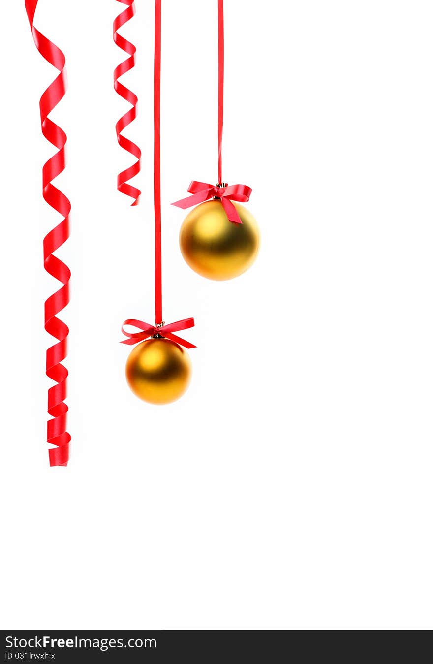 Christmas balls hanging with ribbons on white background