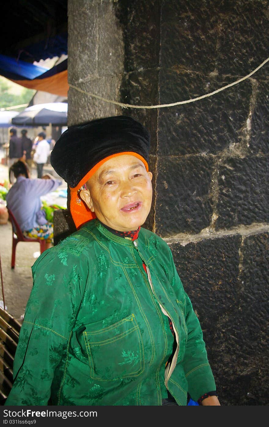 Grandmother White Hmong ethnic in Van market . Area of Ha Giang. North Vietnam