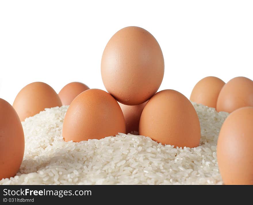 Many pile up chicken eggs on the rice. Many pile up chicken eggs on the rice