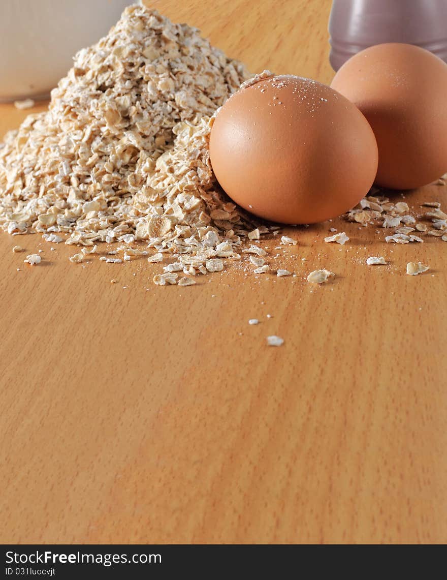 Eggs, milk, oatmeal put together on the table. Eggs, milk, oatmeal put together on the table