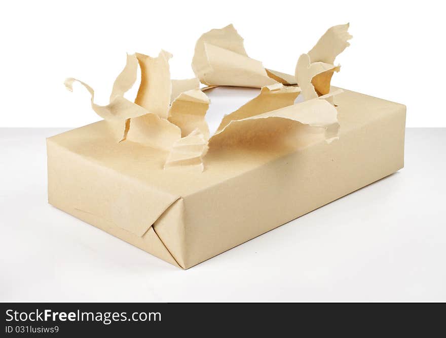 Brown paper cardboard box package torn. Brown paper cardboard box package torn