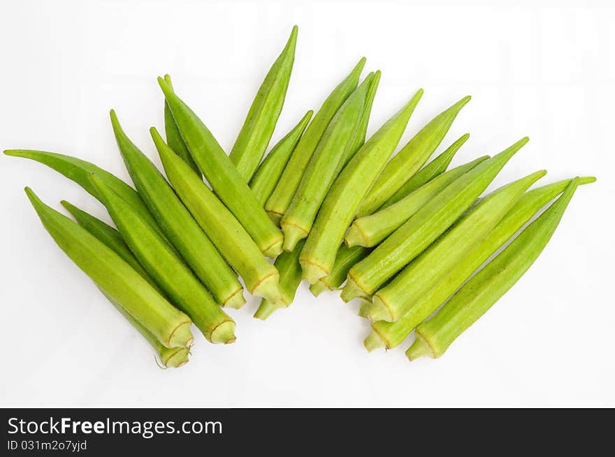 Arrangement Of Lady Finger Vegetable On White Background