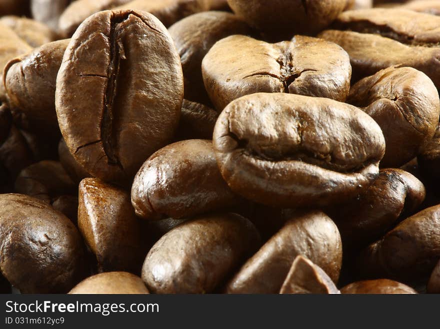 This is a heap of coffee beans. This is a heap of coffee beans