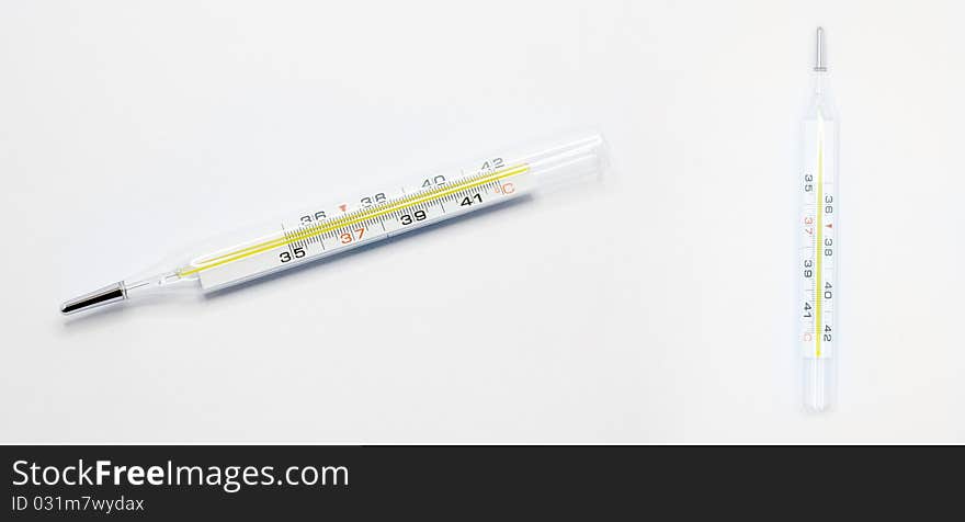 Two thermometer on white background