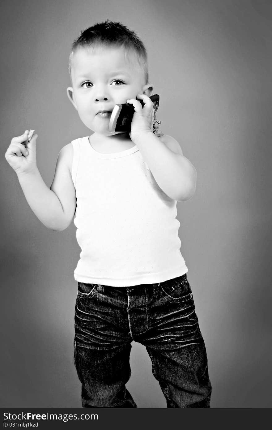 Little boy talking on the phone