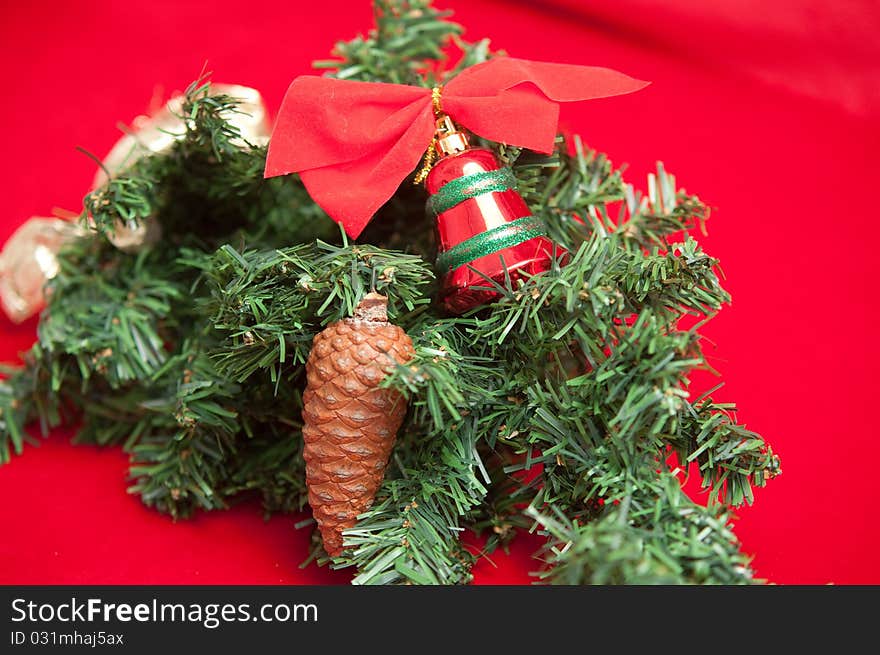 Christmas tree decorated with Christmas Bell and pine cone . Christmas tree decorated with Christmas Bell and pine cone .