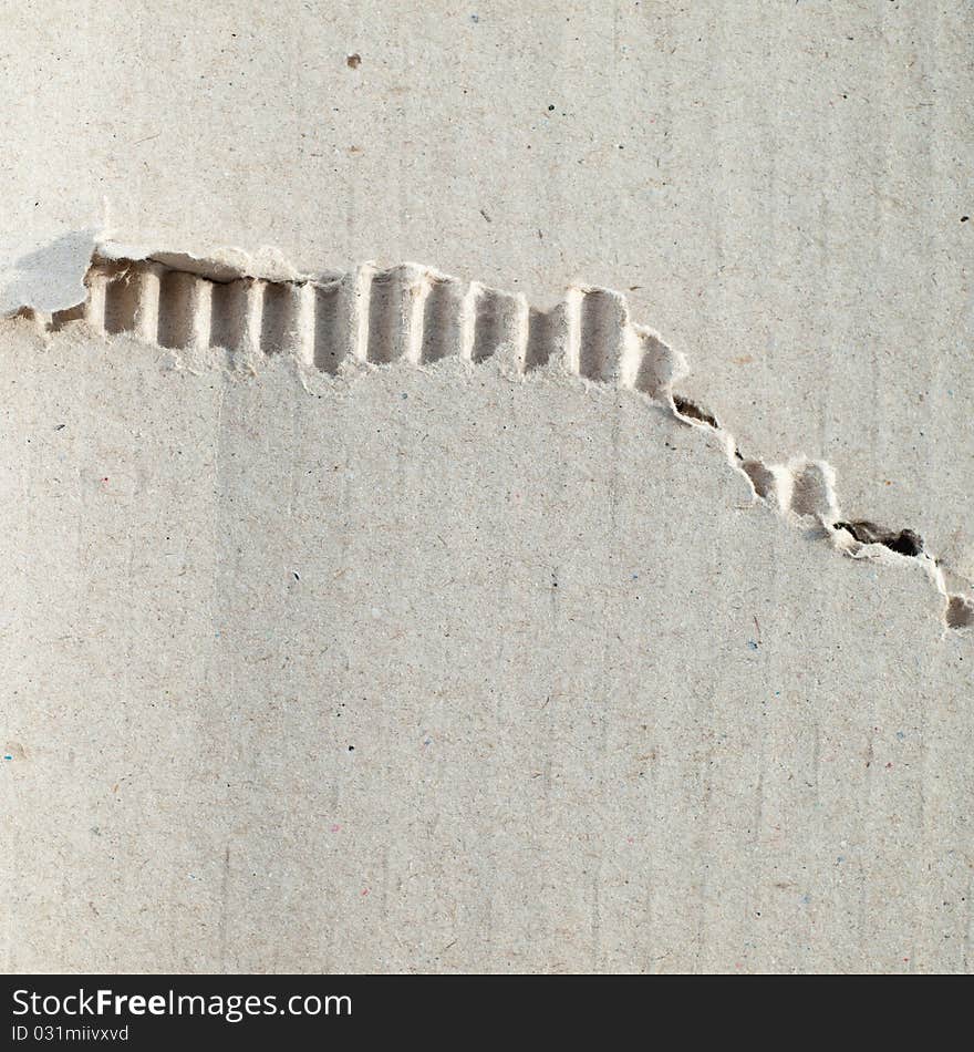 Torn Brown crumpled cardboard paper background