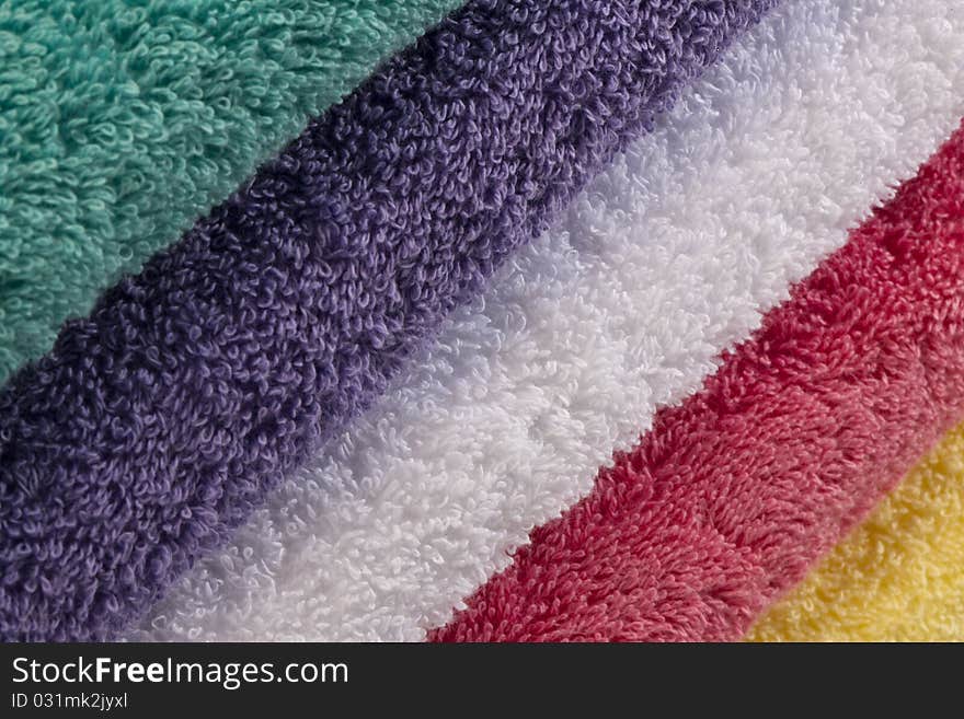 Bath towels against a white background in a studio environment