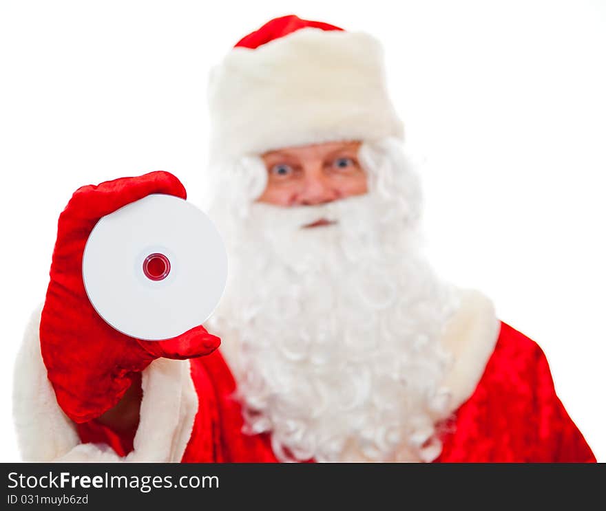 Close up of Santa Claus with a CD isolated on white. Sharpness on the CD. Close up of Santa Claus with a CD isolated on white. Sharpness on the CD.