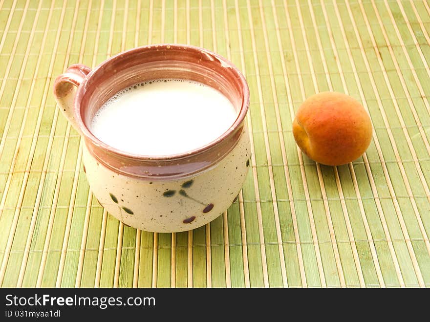 A cup of milk and apricot