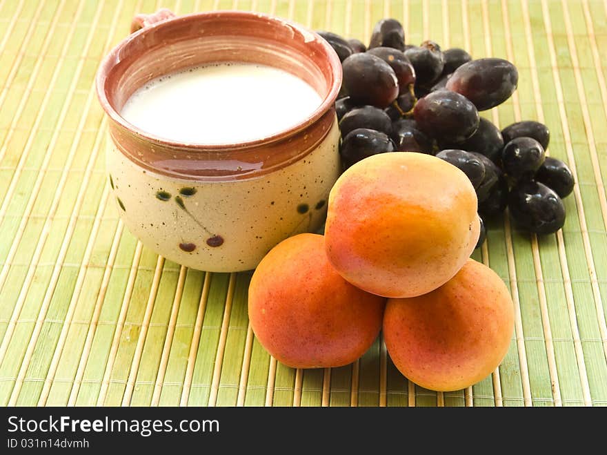 Cup of milk grape and apricots