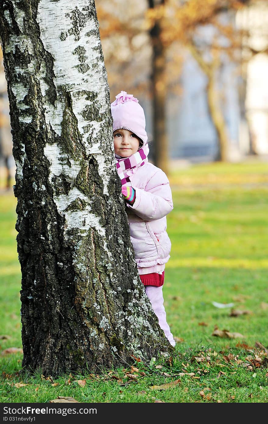 Pretty girl in park. Autumn day