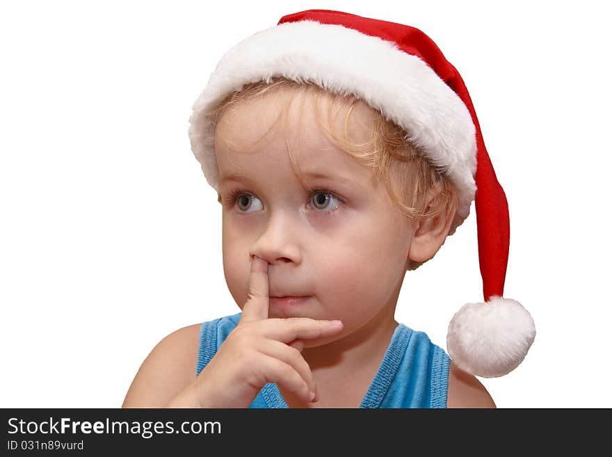 Little Santa Claus in red hat standing with a finger in his nose, isolated on white. Little Santa Claus in red hat standing with a finger in his nose, isolated on white