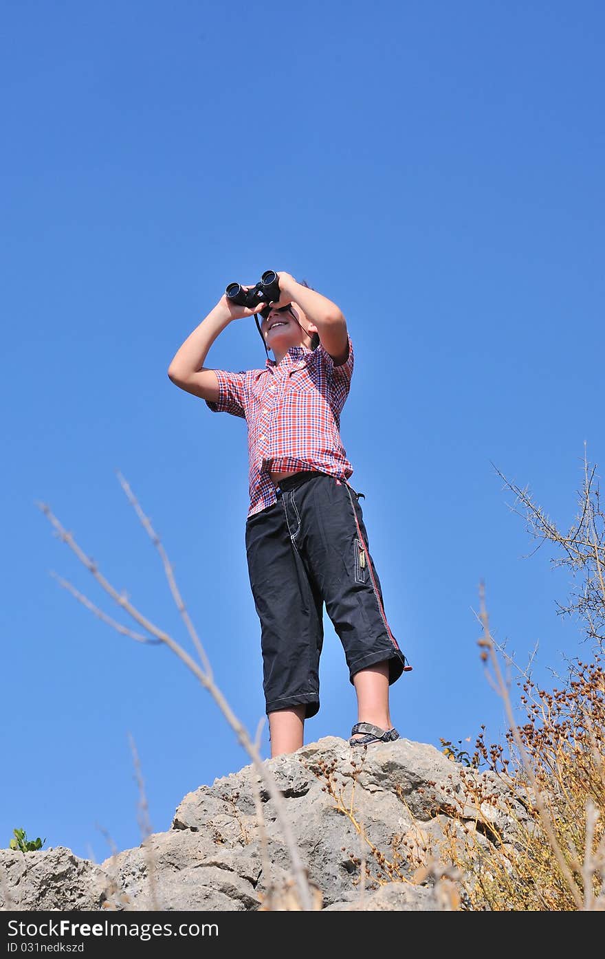 Boy with binoculars 2