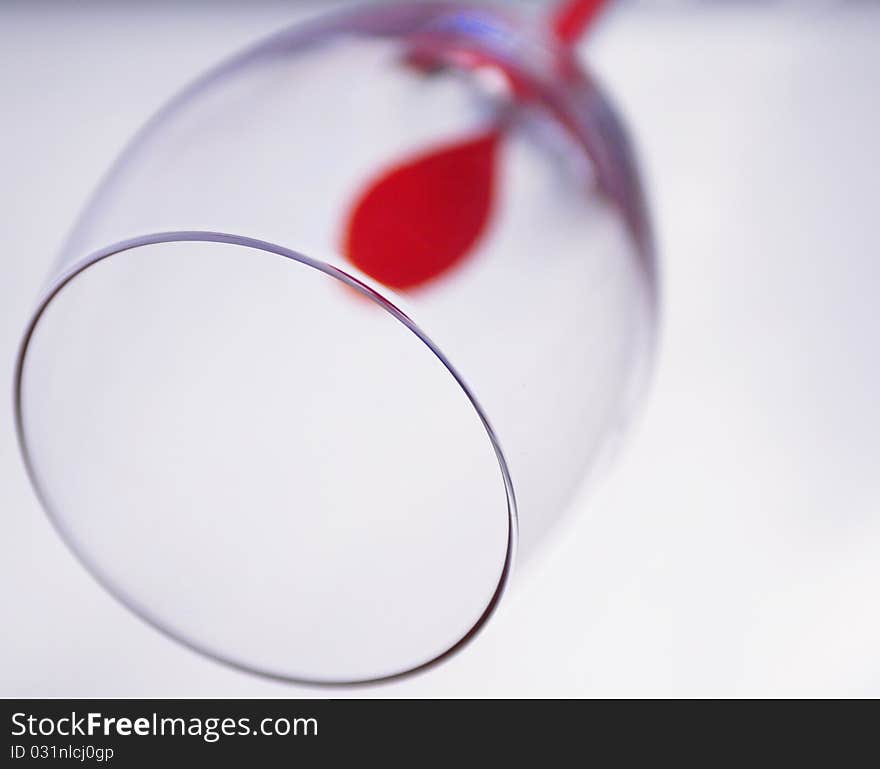 Glass with a red drop