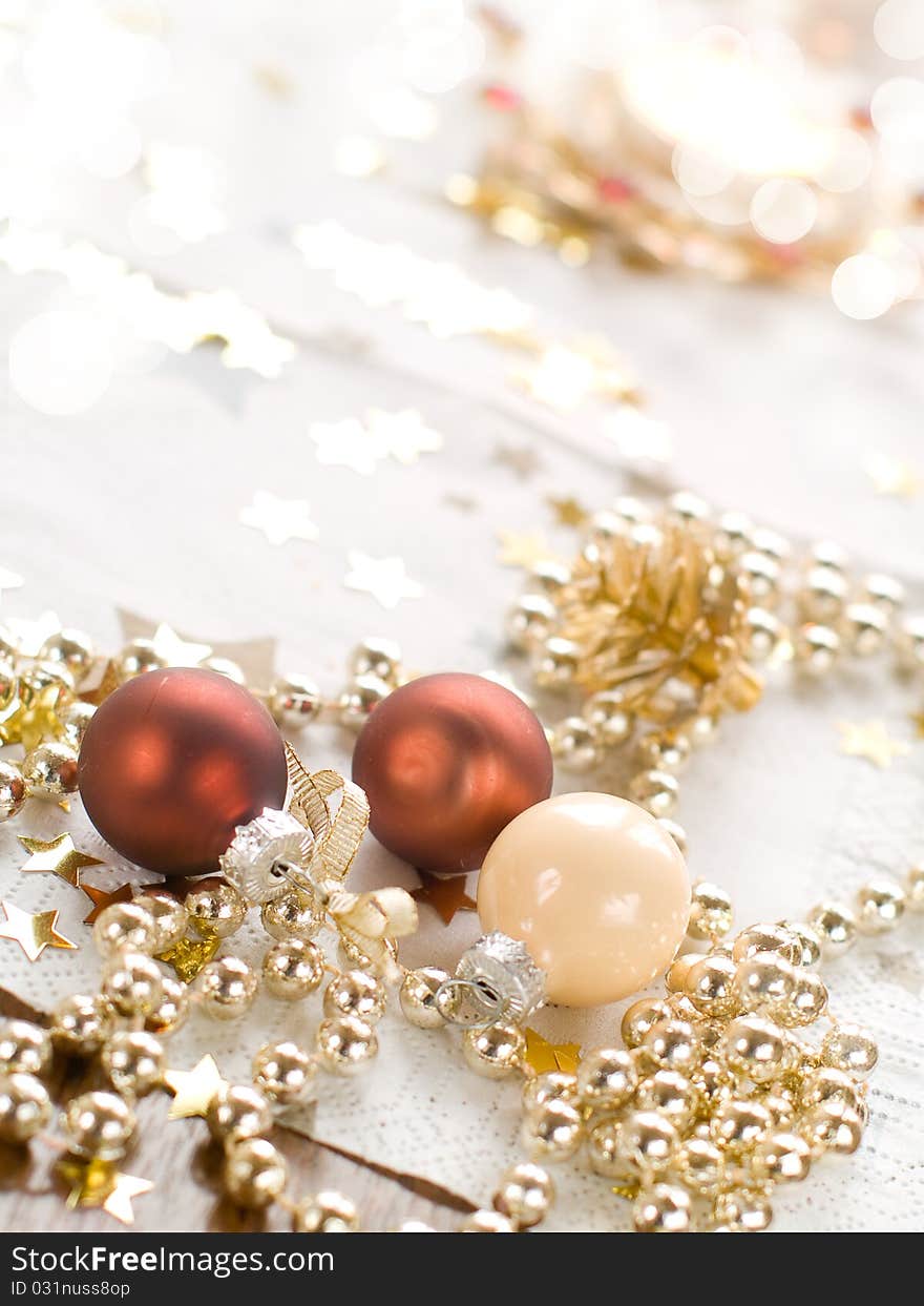 Christmas  baubles on defocused lights background. Christmas  baubles on defocused lights background