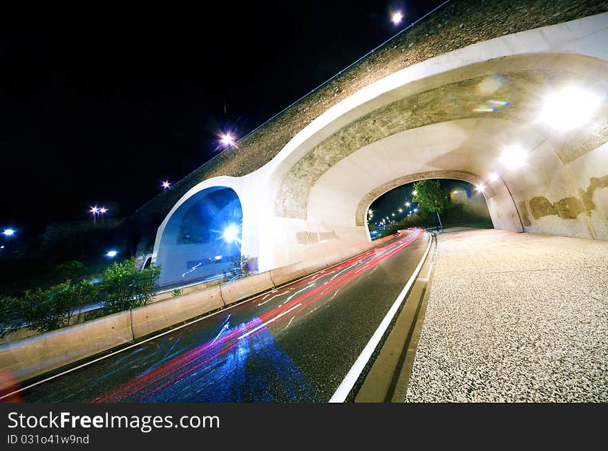 Nigth city scene with road and bridge