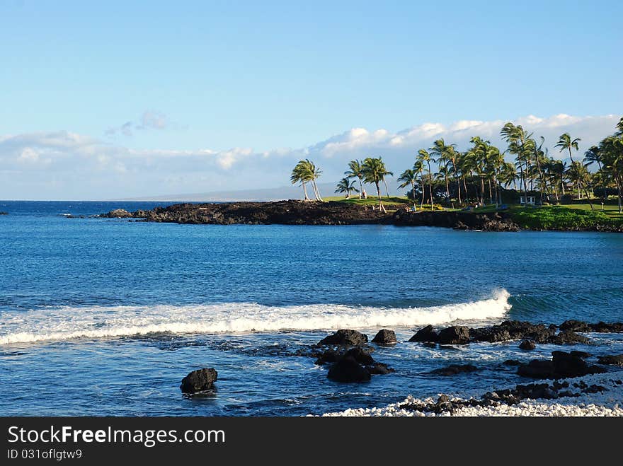 The waves wash ashore from the Pacific Ocean on the Big Island of Hawaii. The waves wash ashore from the Pacific Ocean on the Big Island of Hawaii