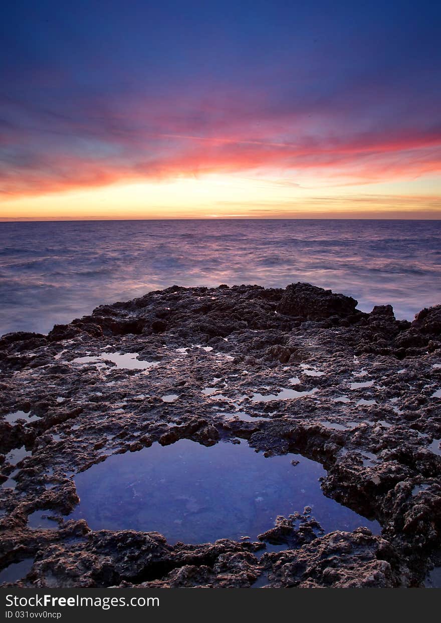 Bright colour on sky during sundown with reflection on water. Bright colour on sky during sundown with reflection on water