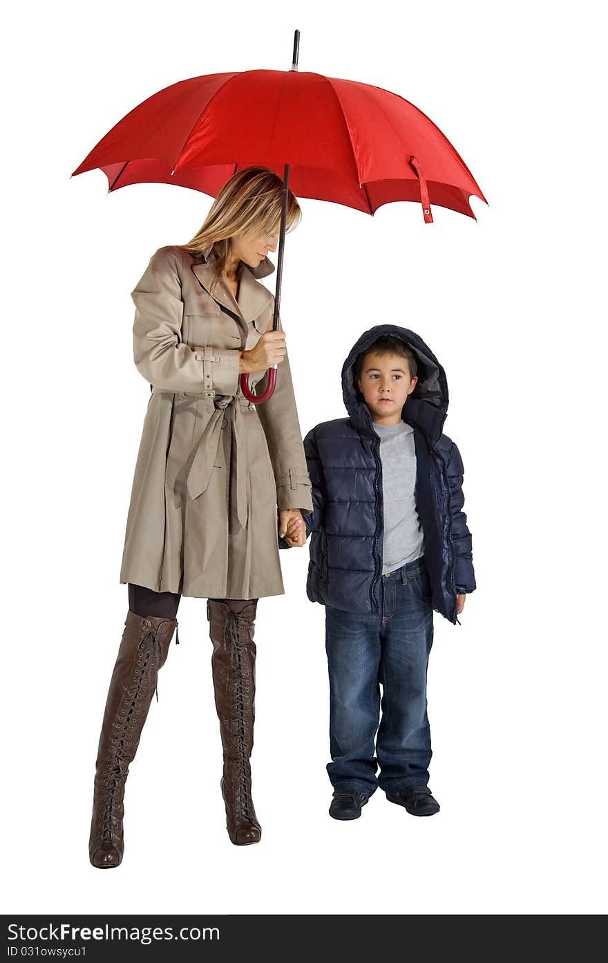 Happy smiling woman and child under their umbrellas. Happy smiling woman and child under their umbrellas