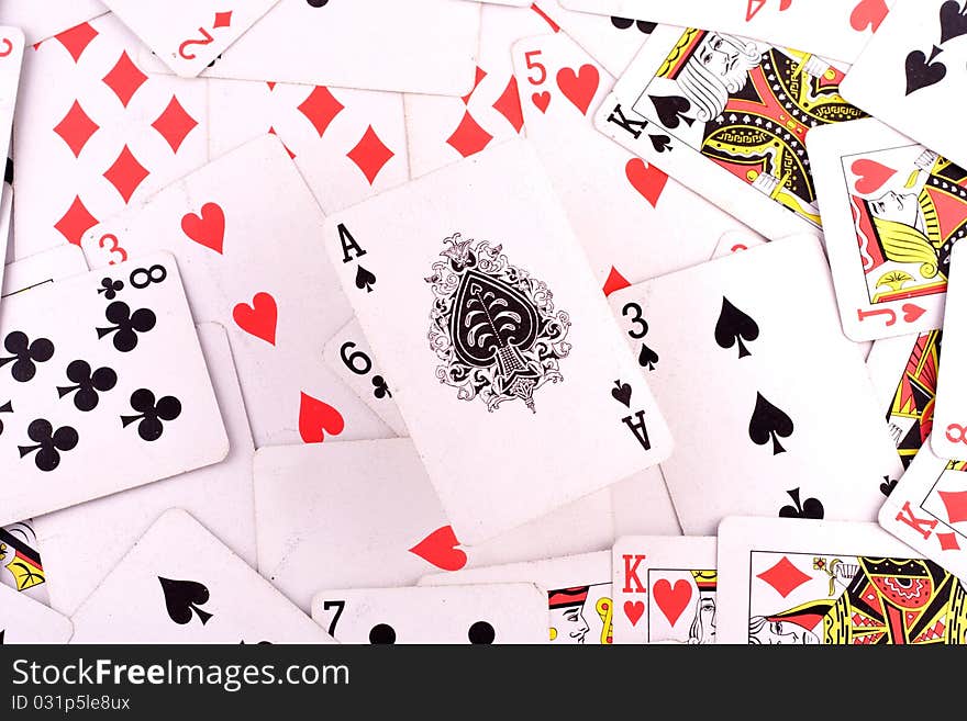 The Ace of Spades in the middle of a deck of cards.