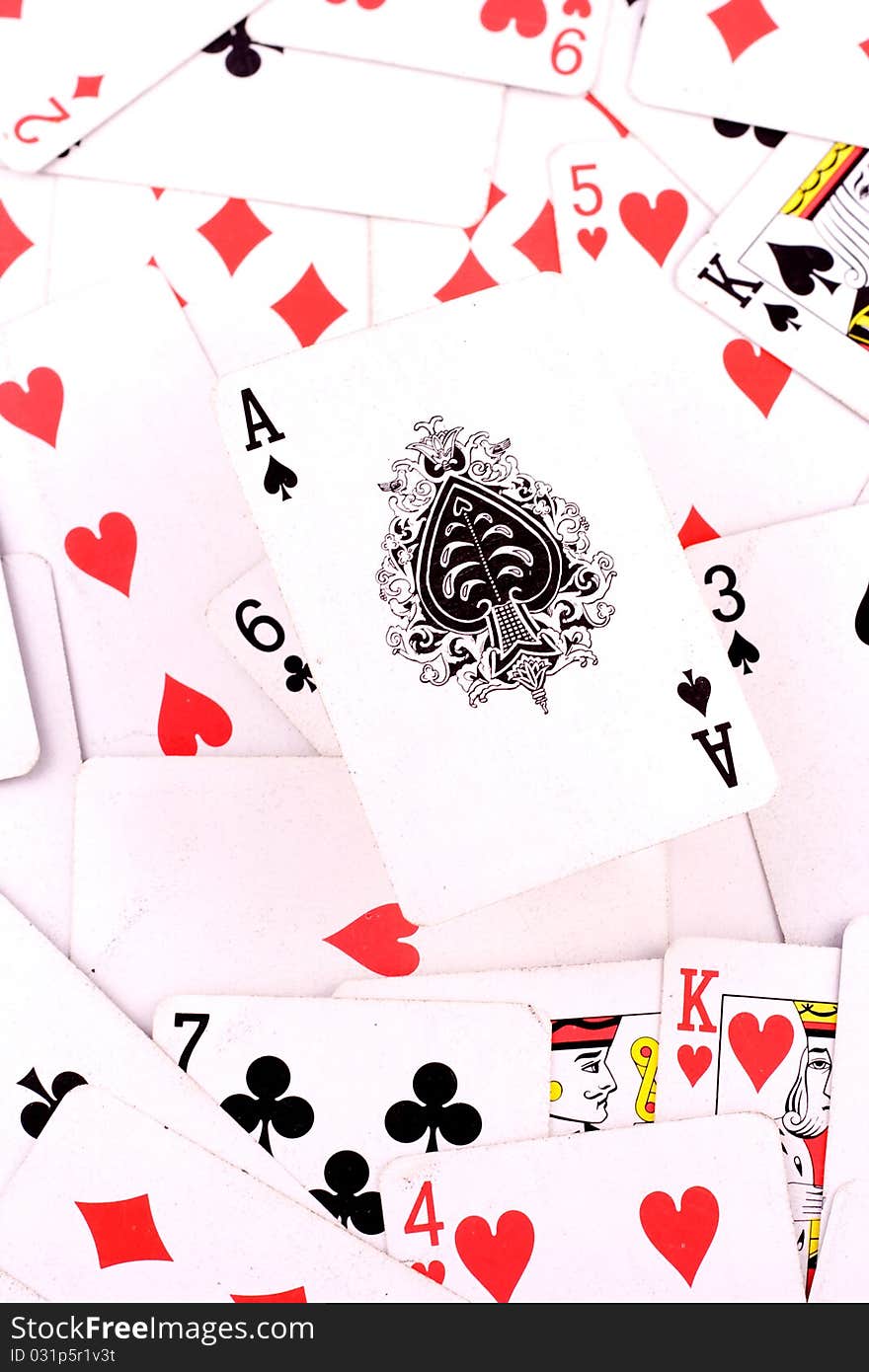 The Ace of Spades in the middle of a deck of cards.