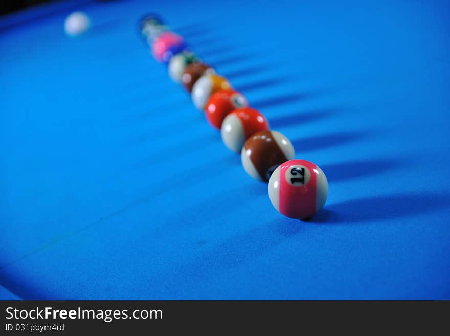 Young man play pro billiard game