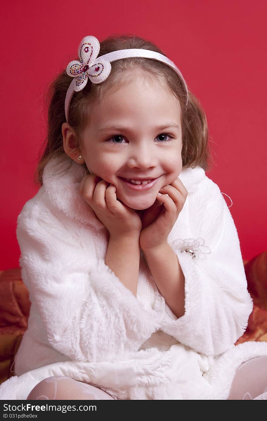 Portrait of a well-dressed cute and happy little girl. Portrait of a well-dressed cute and happy little girl