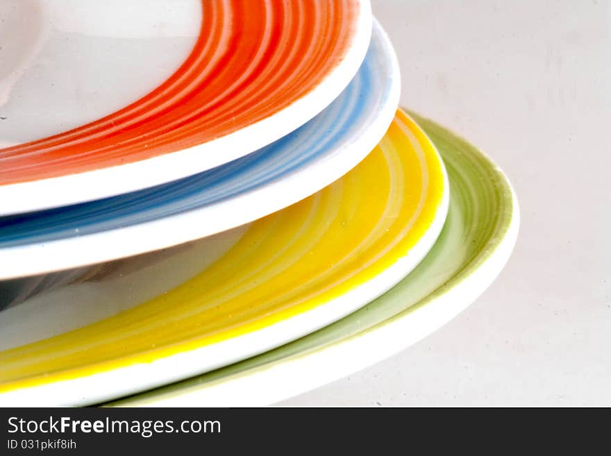 Porcelain plates paintings of various colors. Porcelain plates paintings of various colors